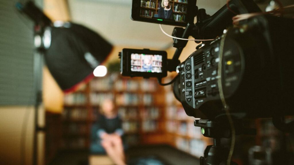 A photo of a modern camera during the filming of an interview