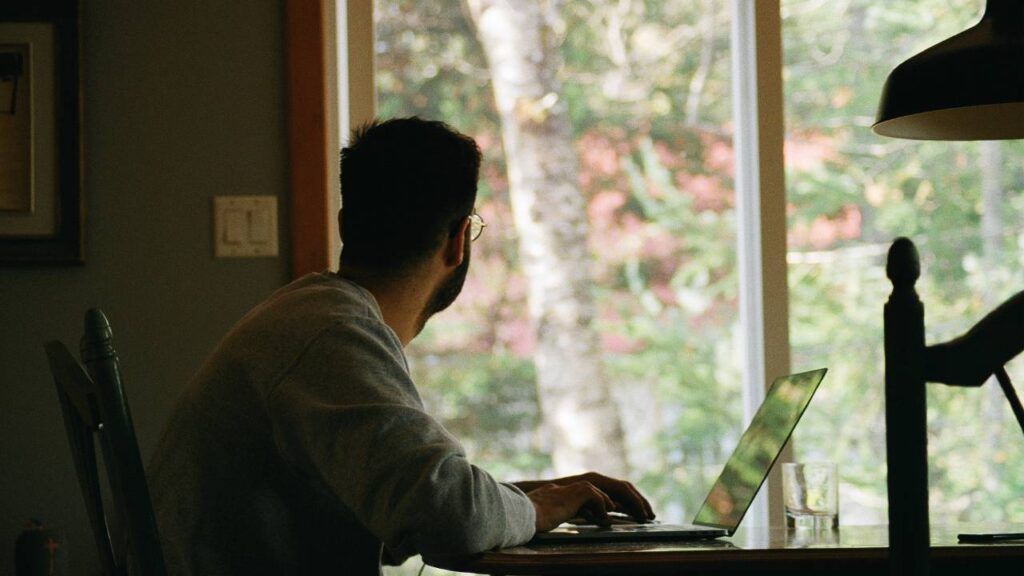 A remote worker looking out of the window