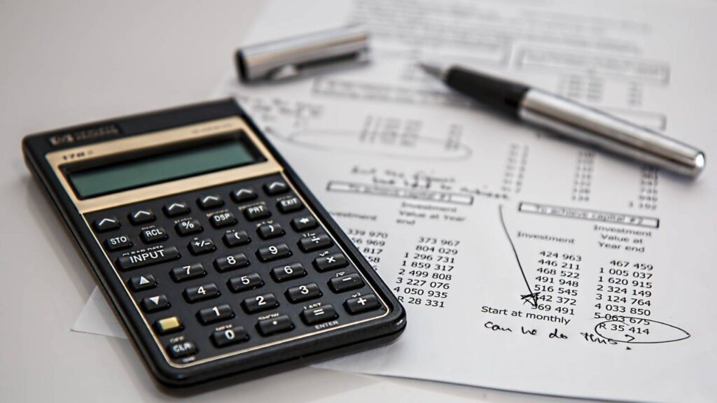 A calculator placed on a taxation bill