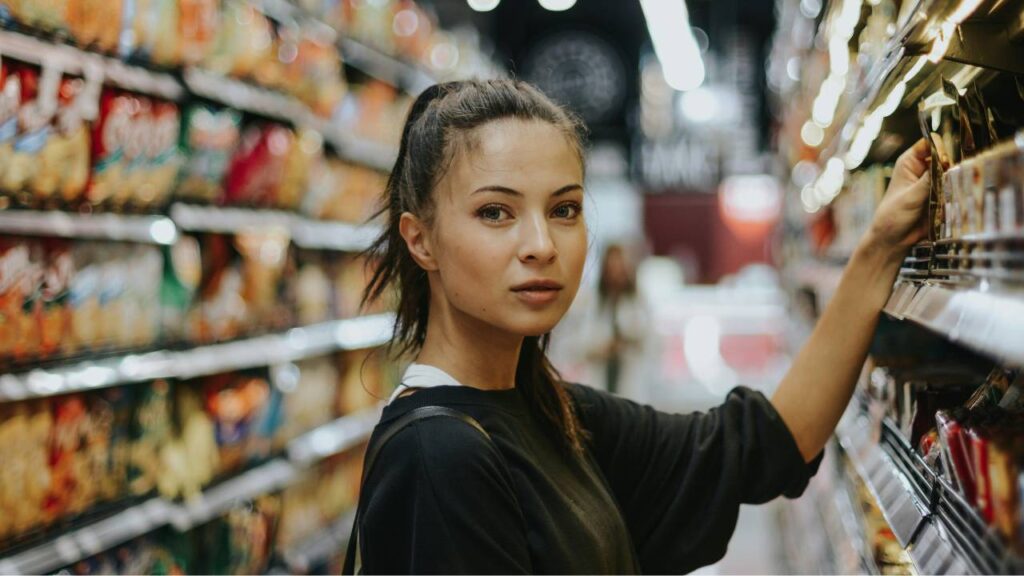 A photo of a girl shopping in a supermarket