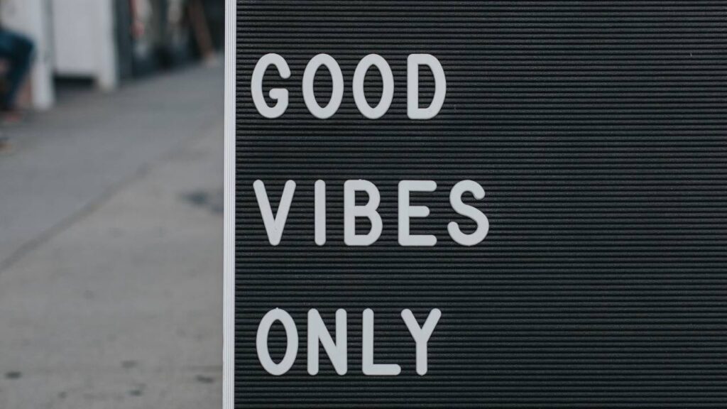 A photo of a street sign saying good vibes only