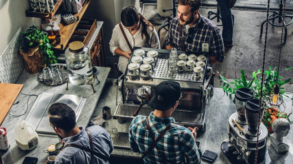 A photo of customers getting served in a cafe